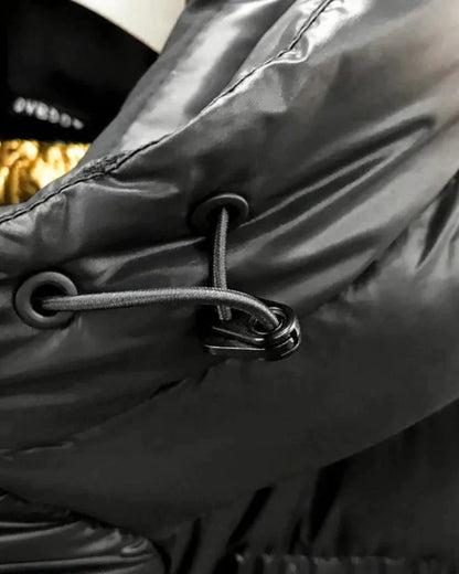 Women’s Long Puffer Jacket with Hood and Quilted Panels